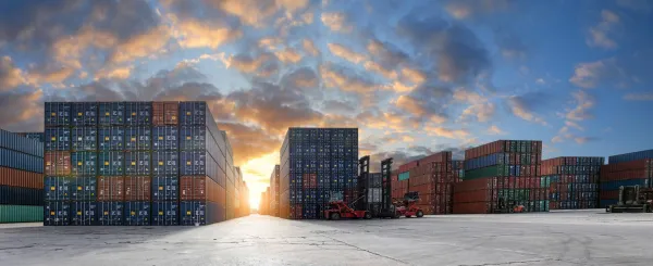 stack-of-containers-in-a-harbor-shipping-containe-2026-01-08-23-36-17-utc1-696f85cc3d725